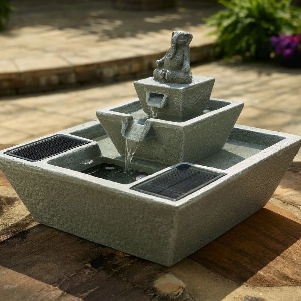 Outdoor water fountain with solar panel on a patio