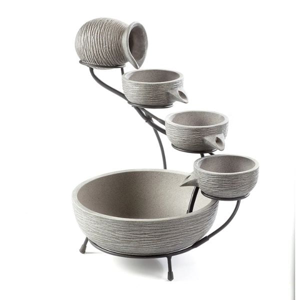 Decorative bowl with multiple compartments on a white background