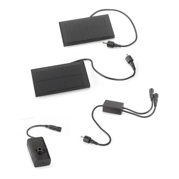 Set of solar panels and charging cables on a white background