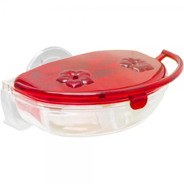 Clear container with a red lid featuring a floral design on a white background