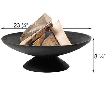 A black, round fire pit holds several pieces of chopped wood. Dimensions indicate a width of 23.25 inches and a height of 8.25 inches.