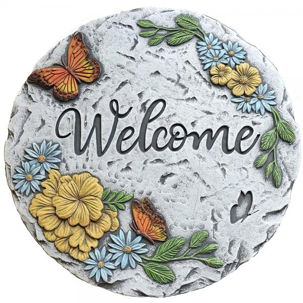 Decorative stone with 'Welcome' text, flowers, and butterflies on a white background