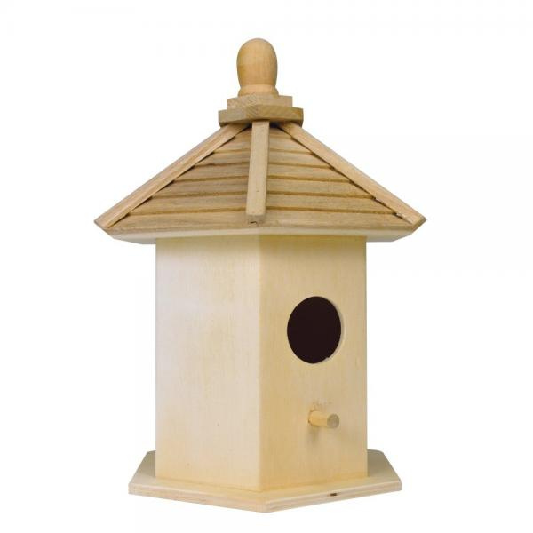 Wooden birdhouse with a pointed roof on a white background
