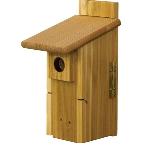 Wooden birdhouse with a slanted roof on a white background