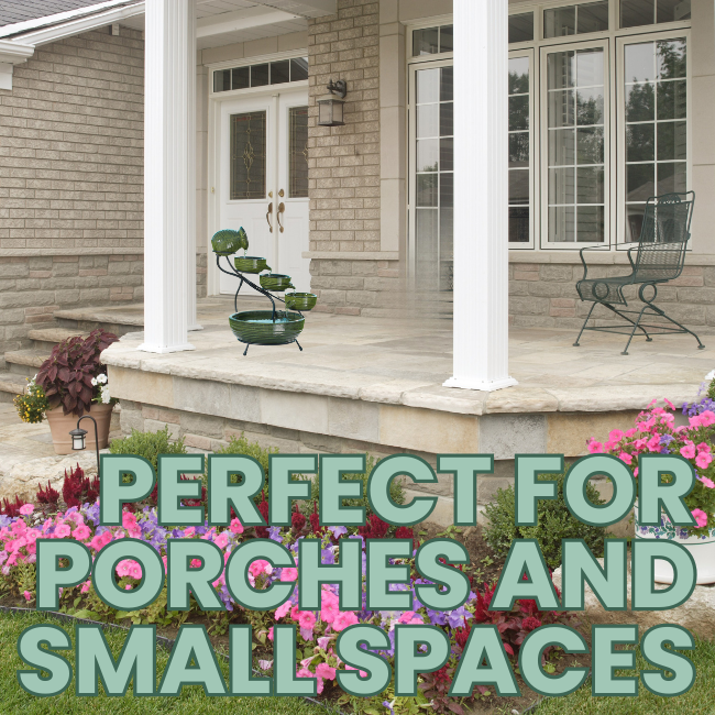 A cascading solar fountain on a porch with vibrant flowers around it.