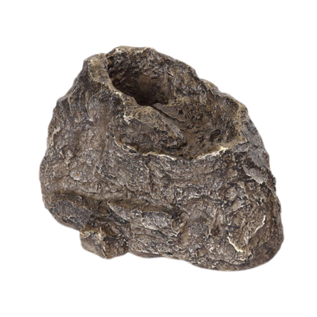 A bird taking a bath in a birdbath featuring the Stonecreek Waterfall Rock, showcasing the moving water effect.