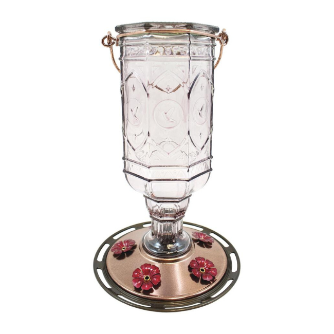Full frontal view of the Amethyst Jewel hummingbird feeder showing the eight-sided vintage glass bottle with embossed hummingbird patterns and five red flower ports.