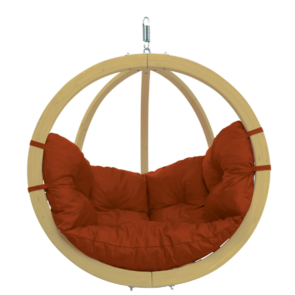 Hanging chair with red cushions and wooden frame on a white background