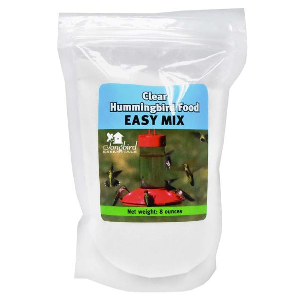 Clear hummingbird food easy mix package with a label showing a hummingbird feeder and birds.