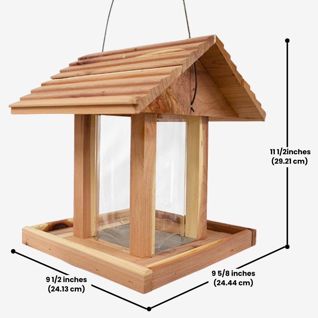 Eco-friendly Amish Made Cedar Hopper Feeder with a seed cylinder, ideal for backyard birdwatching and feeding