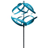  A close-up of the Aqua Swirl Wind Spinner’s dual spinning blades, designed to catch the wind and create a beautiful, spherical motion in your yard.