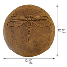 Close-up of a round dragonfly concrete stepping stone with an autumn wheat finish, featuring veined wings, ideal for creating a charming garden pathway.

