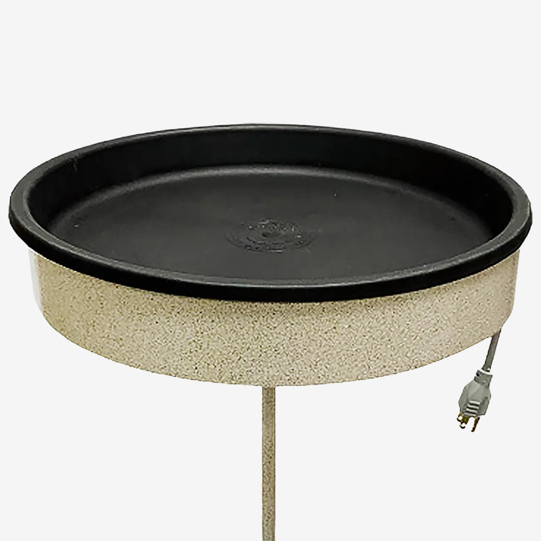 Beige Erva heated bird bath with pole, ideal for preventing water from freezing in cold weather