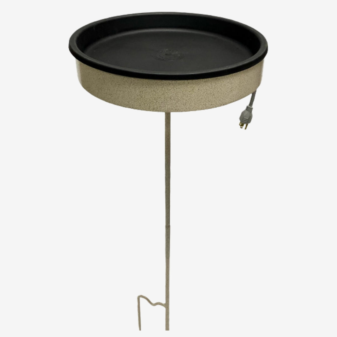 Beige Erva heated bird bath with pole, ideal for preventing water from freezing in cold weather