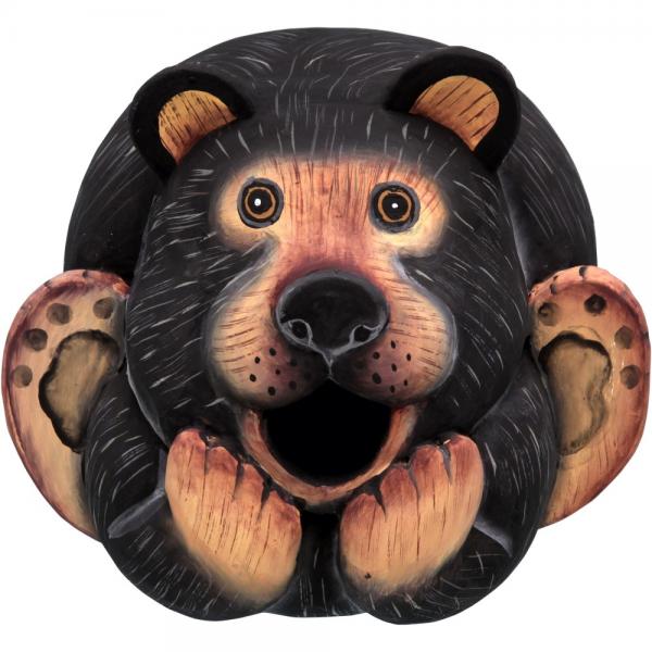 Round decorative item with a bear face design on a white background