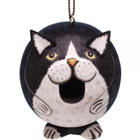 Cat-shaped birdhouse with black, white, and gray design on a white background