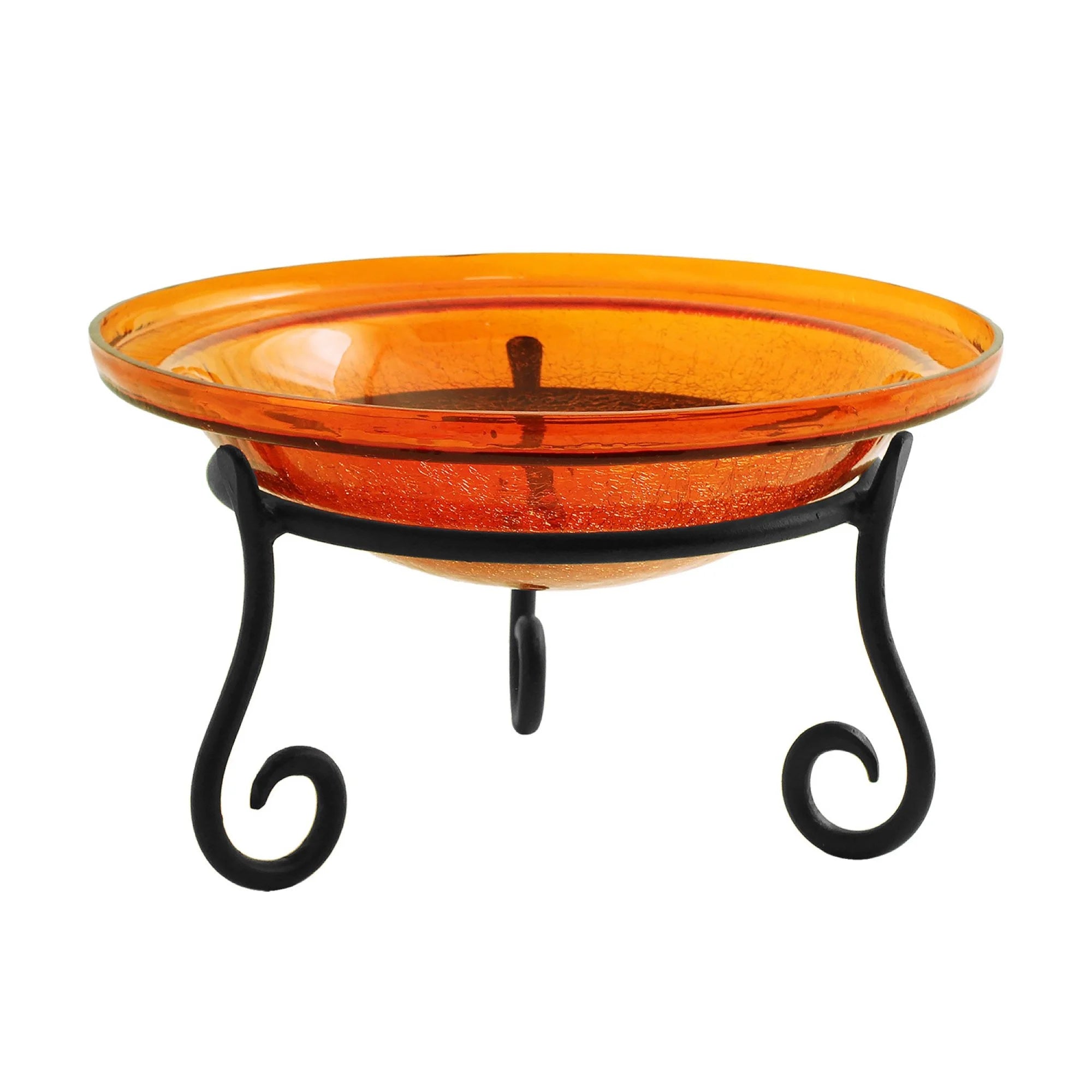 Orange glass bird bath with black metal stand on a white background