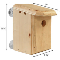 Wooden birdhouse with dimensions indicated on a white background