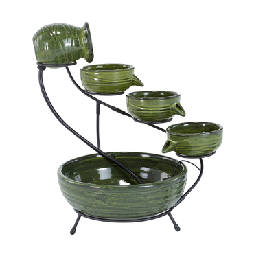 Close-up of a green cascading solar fountain, showcasing its vibrant color and cascading tiers.