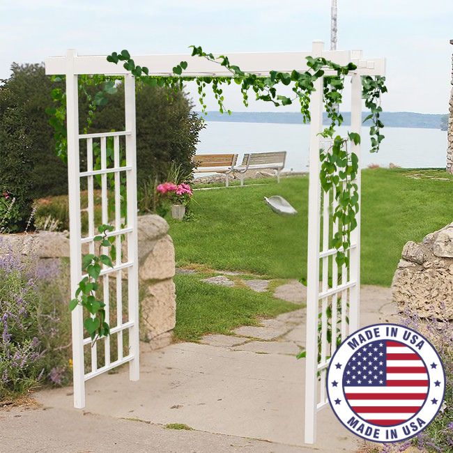 The Classic Garden Arbor featuring rectangular grid panels with climbing ivy, providing support and adding a fresh, green touch to a pathway.