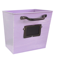 A ColorPop Garden Wall Planter in purple with a chalkboard label, perfect for hanging on walls to display your plants in style.