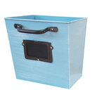  A single ColorPop Garden Wall Planter in blue with a chalkboard label, perfect for organizing plants in a quirky, office-inspired design.