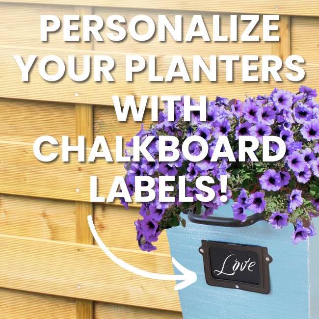 A ColorPop Garden Wall Planter in blue, featuring purple flowers and a chalkboard label that can be personalized with names or messages.