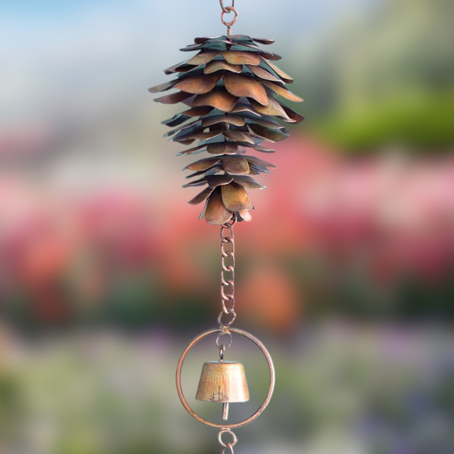 Detailed view of a single pine cone from the Copper Pine Melody wind chime set, showcasing the flamed copper finish and bell. 