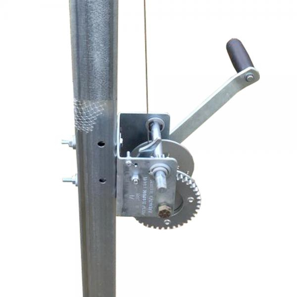 Metal pulley system attached to a vertical pole on a white background
