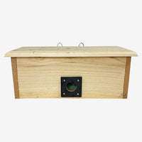 Coveside winter roost with horizontal design, offering birds warmth and protection.