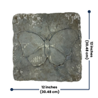 Close-up of a concrete stepping stone with a finely detailed butterfly design, showcasing its durable construction and gray finish for outdoor use.