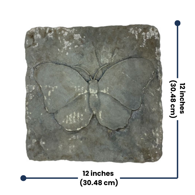 Close-up of a concrete stepping stone with a finely detailed butterfly design, showcasing its durable construction and gray finish for outdoor use.