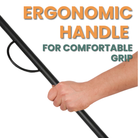 Person comfortably gripping the Blaze Booster Fire Blowpipe, featuring an ergonomic handle for easy use and control while stoking the fire.