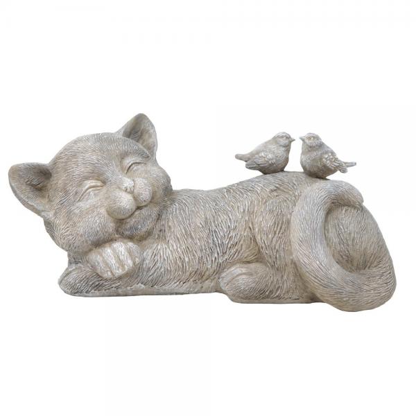 Statue of a cat lying down with two birds on its back against a white background