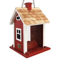 Red Christmas cottage bird feeder by Home Bazaar, designed to attract birds while adding festive charm to your garden.