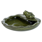 A detailed close-up of the ceramic frog-shaped solar fountain, featuring its vibrant green glaze and charming frog spout.