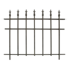 A garden fence with finial-topped bars installed along a garden, providing an elegant and unobtrusive boundary.