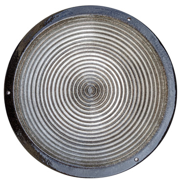 Round metallic birdbath with concentric circular patterns on a white background
