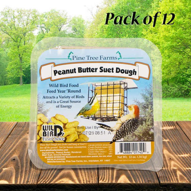 Pack of 12 Pine Tree Farms Peanut Butter Suet Dough, wild bird food, 12 oz package, shown with label and image of birds at a feeder.



