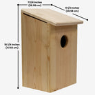 Prime Retreat cedar bird shelter mounted outdoors, ideal for screech owls, saw-whet owls, and kestrels, with natural wood design for nesting and weather resistance.