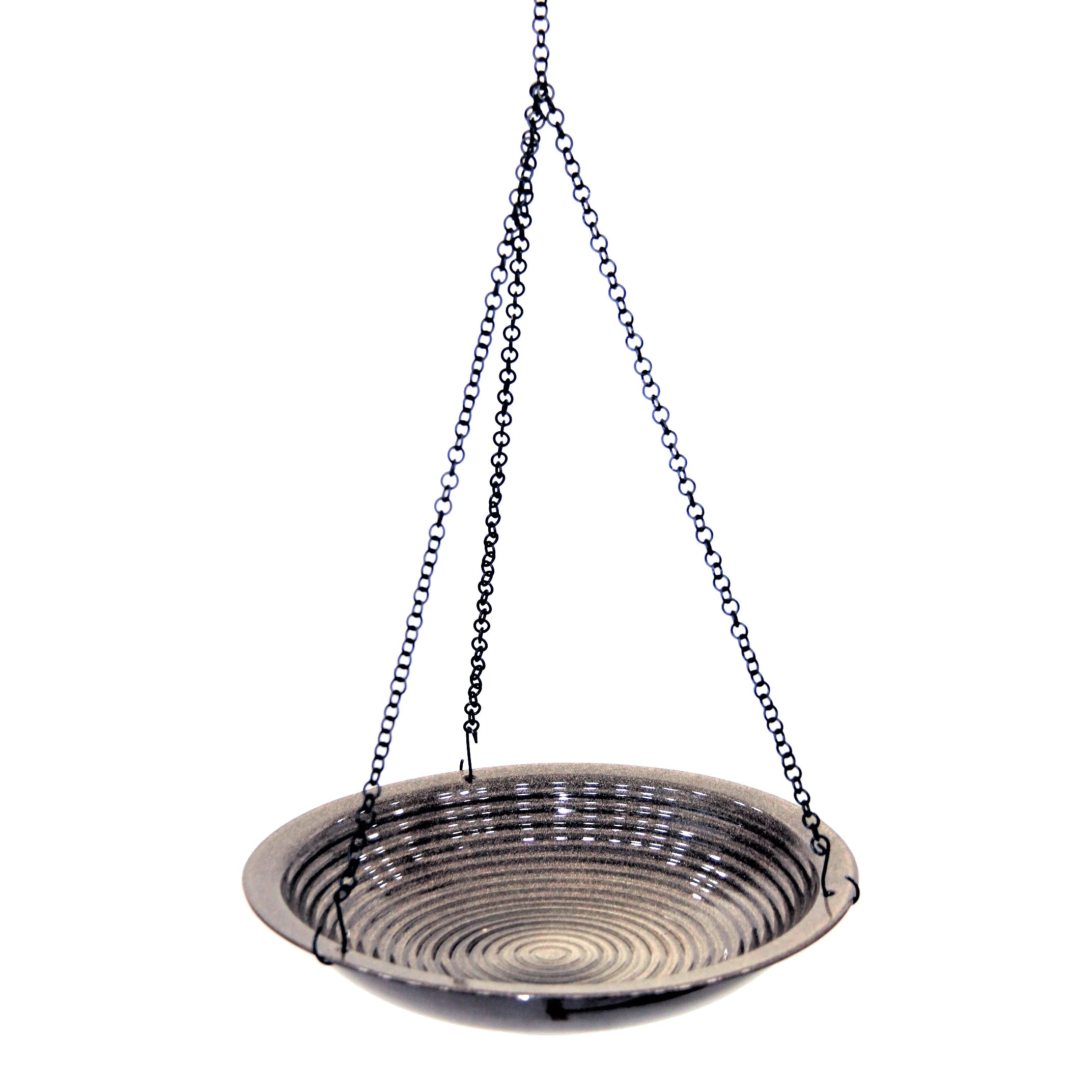 Metal bird bath with chain on a white background