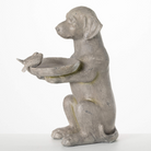 Side view of the Labrador Retriever Bird Feeder, showing the raised dog design holding a seed dish with a decorative bird.