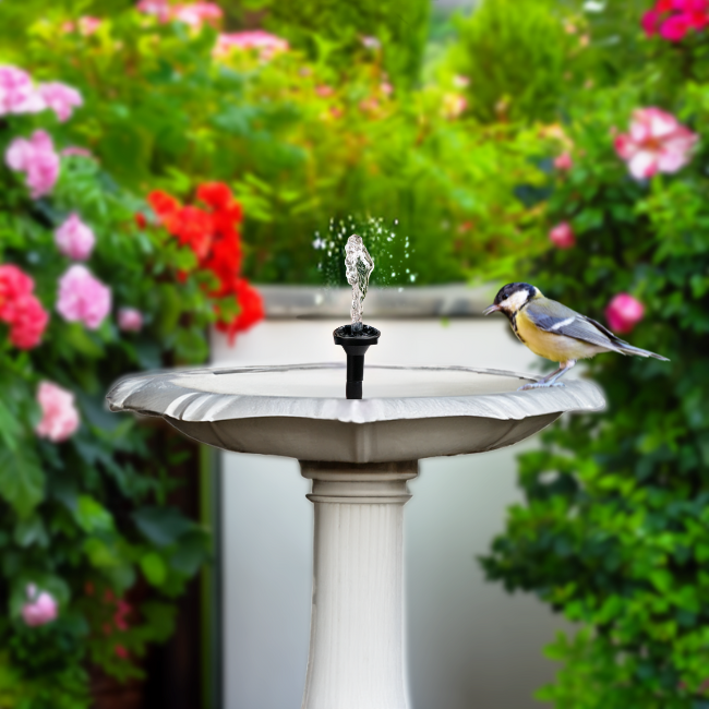 Solar panel with accessories, including a long cable and adjustable nozzles for the solar fountain pump. Easily customize your birdbath's water flow, making it perfect for attracting birds with no electricity needed.