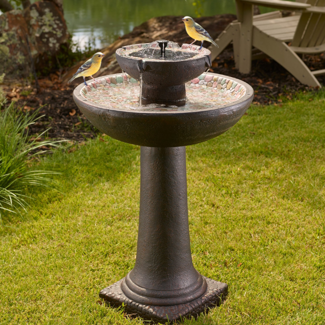 Solar Pebble Stream Fountain with a forest brown finish, hand-painted pebbles, and birds perched on the top tier, adding charm to any garden or patio