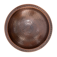 Top-down view of the Perch & Ponder Copper Birdbath, displaying the hammered copper texture and round bowl design.
