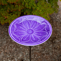 Stylish purple birdbath with a floral embossed design, crafted from steel with multiple layers of Eco-Friendly UV-resistant epoxy to ensure lasting beauty. Stands 39 inches tall with a sturdy bronze-finish wrought iron stake
