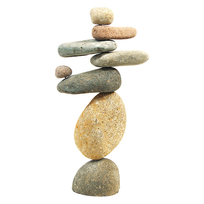 Handcrafted stone sculpture with eight natural river stones in tan, gray, and pink stacked in a vertical design