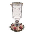 Full frontal view of the Amethyst Jewel hummingbird feeder showing the eight-sided vintage glass bottle with embossed hummingbird patterns and five red flower ports.