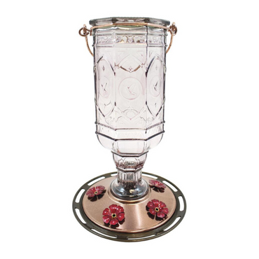 Full frontal view of the Amethyst Jewel hummingbird feeder showing the eight-sided vintage glass bottle with embossed hummingbird patterns and five red flower ports.