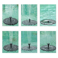 Solar-powered fountain pump kit with adjustable water flow and spray patterns. Perfect for birdbaths and garden decoration, featuring a lightweight, portable design.
